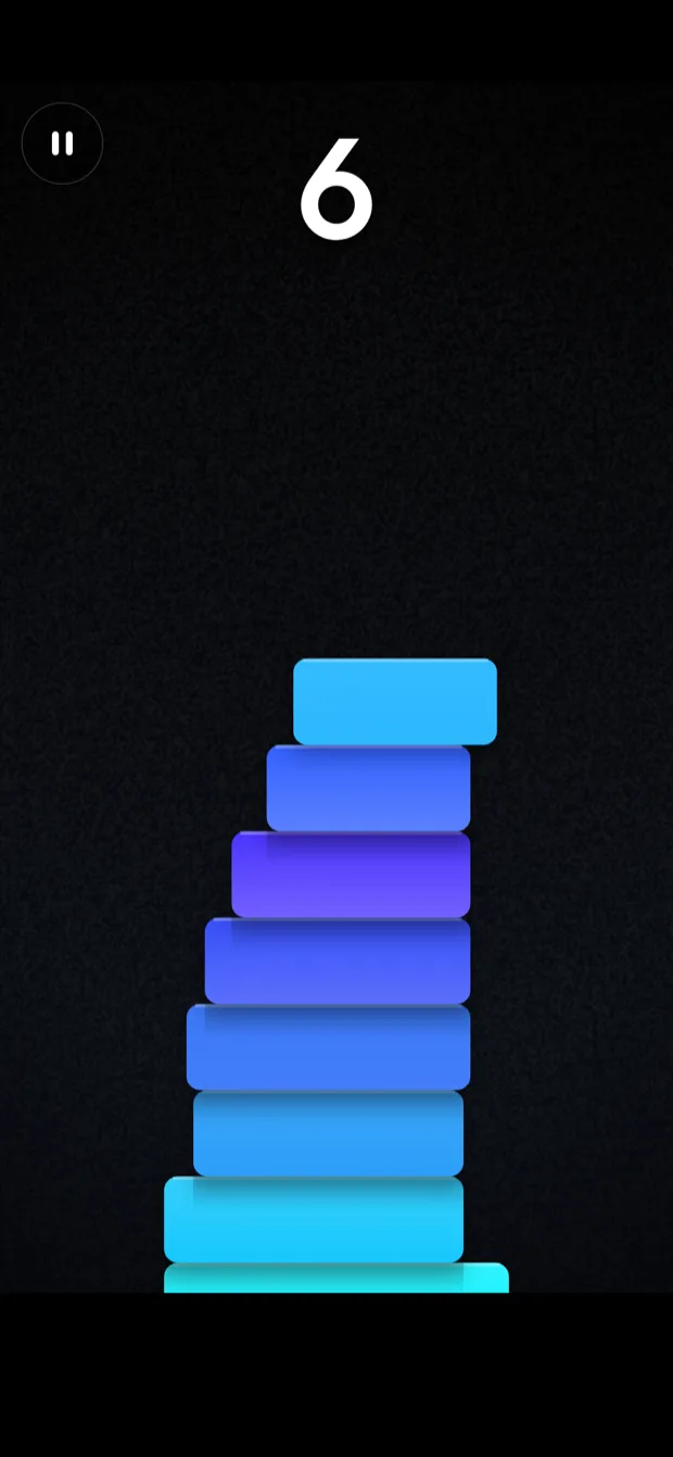 A Stack Tower run in progress: a gradient tower seven blocks high with the score above it